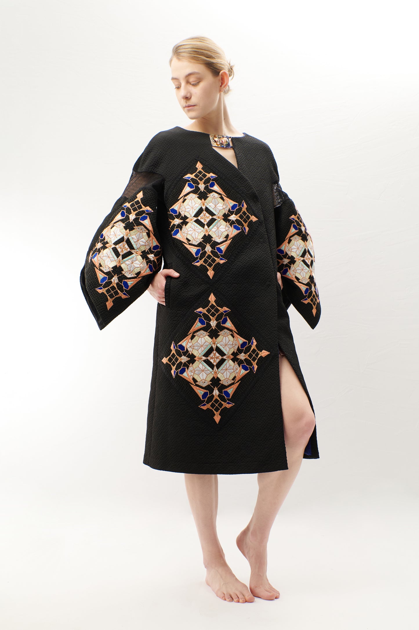 Double-breasted A-line black jacquard coat